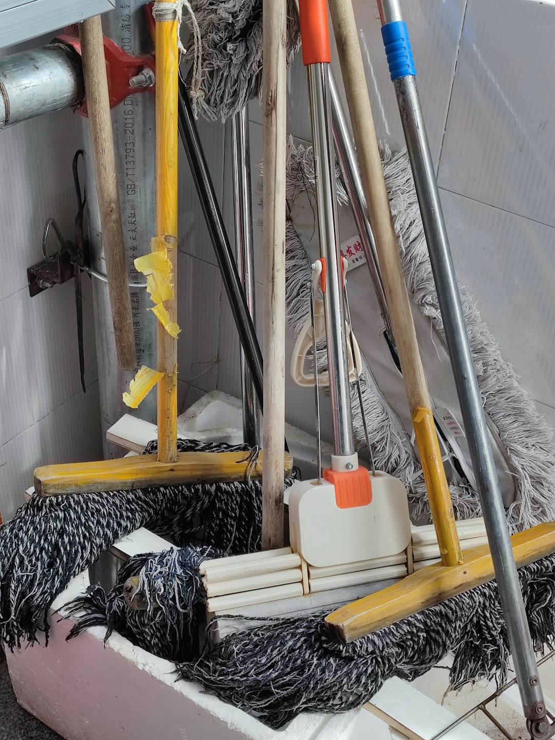 white-plastic-bucket-on-brown-wooden-ladder-qo3d-6mcqfc